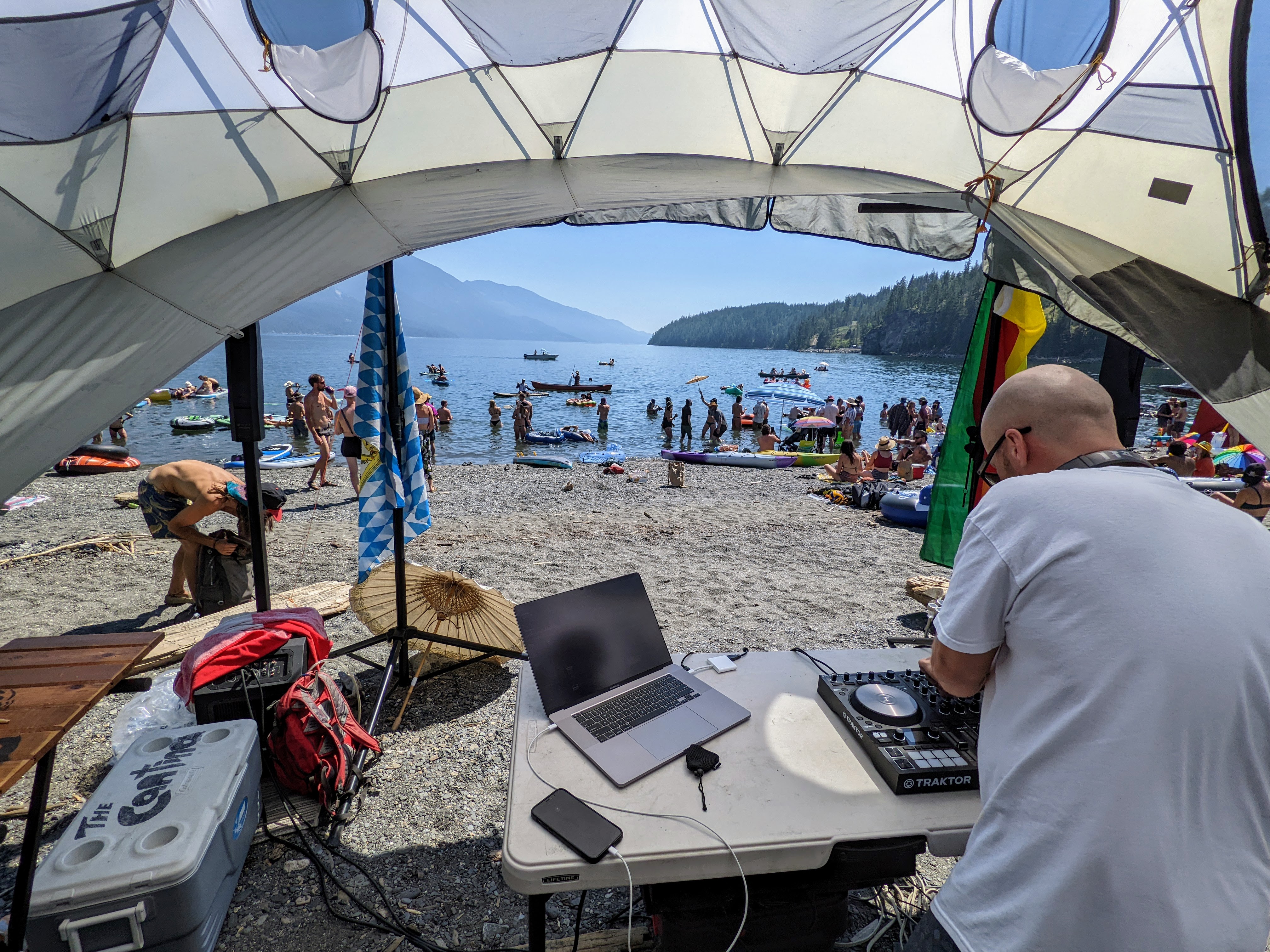 DJ on the beach at Kootenay Lake